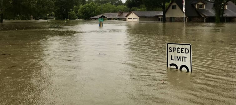 Hurricane Harvey 2017, flooding in Spring Texas, a couple miles north of Houston. Speed limit sign almost completely submerged.
