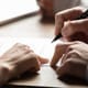 Signing a personal loan document